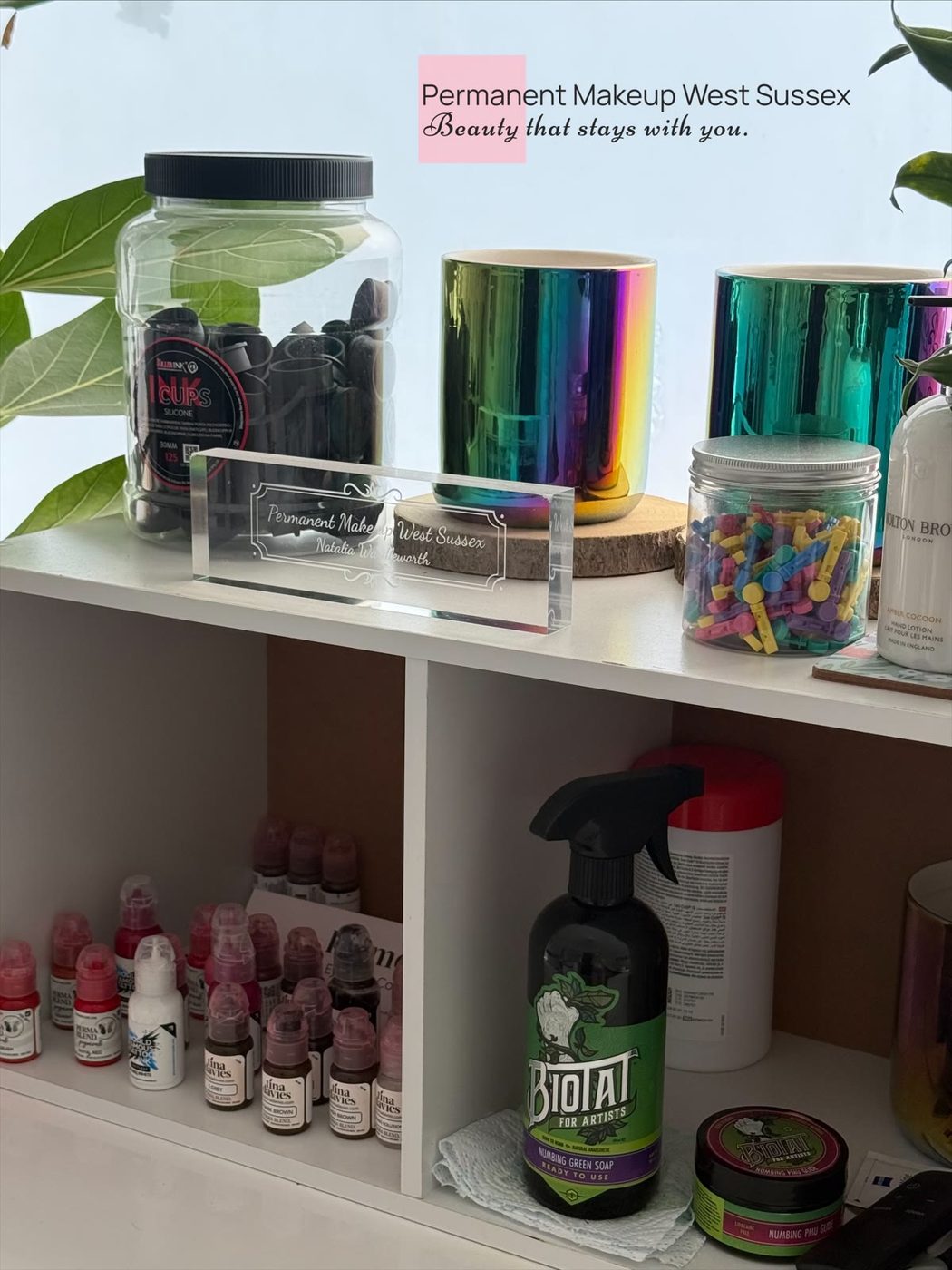 Permanent makeup pigment shades on the studio shelf