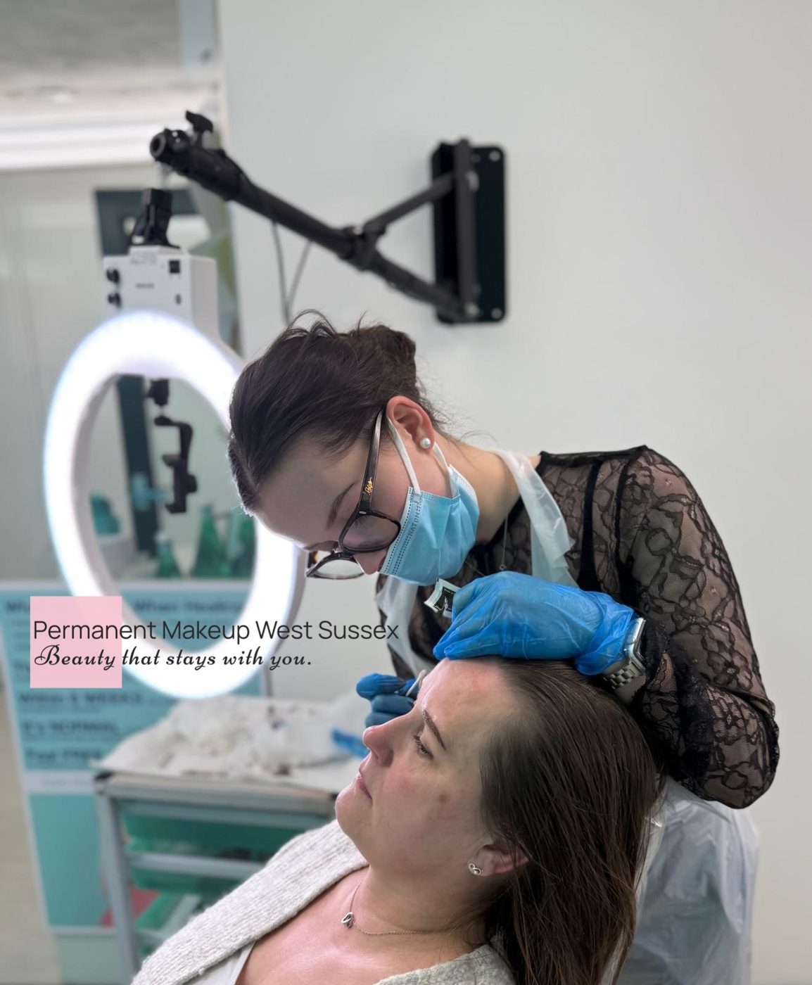 Natalia carrying out a permanent makeup treatment in the studio